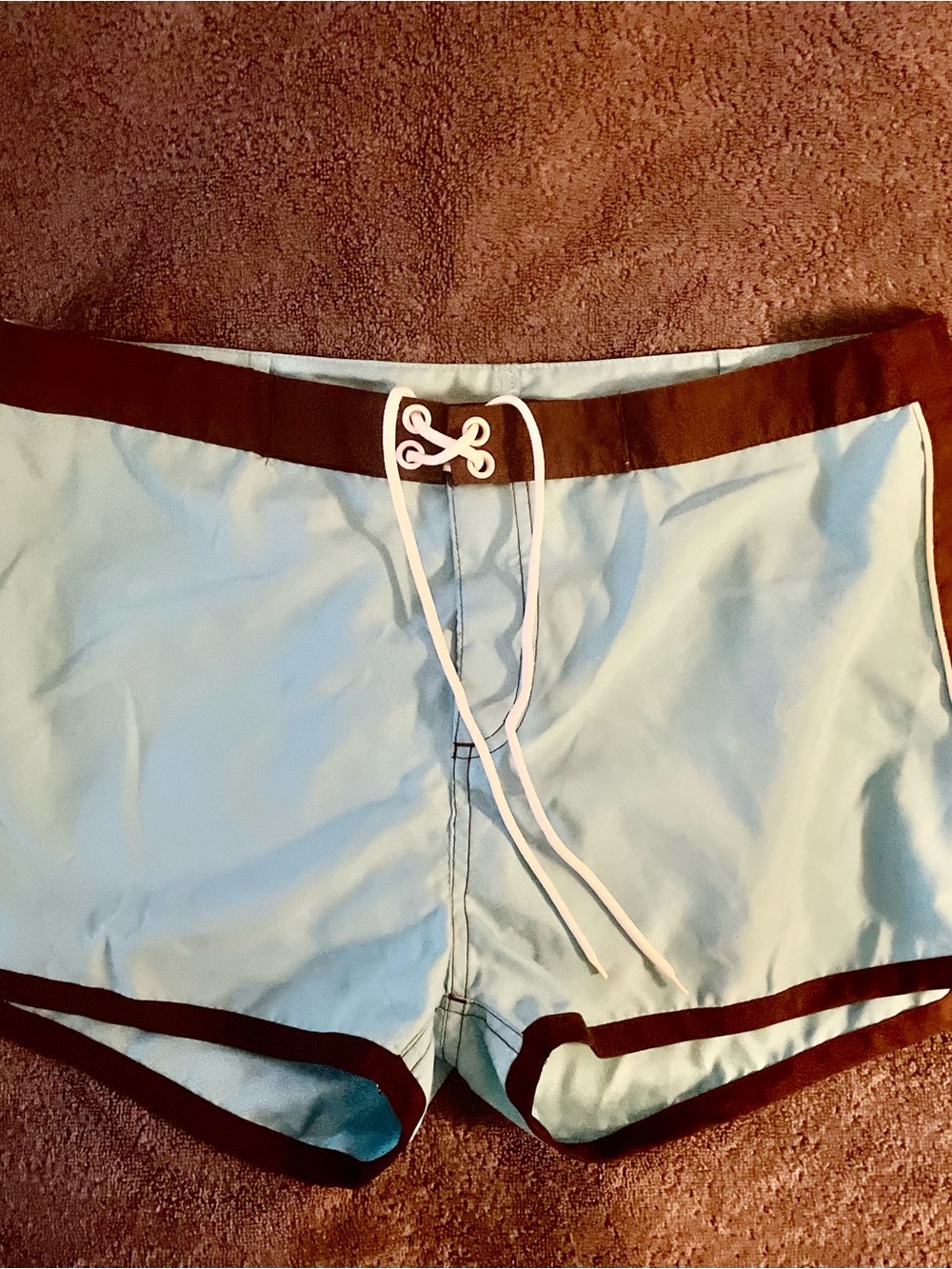 Aqua & brown women’s ( junior) Swim Trunks with white trim.